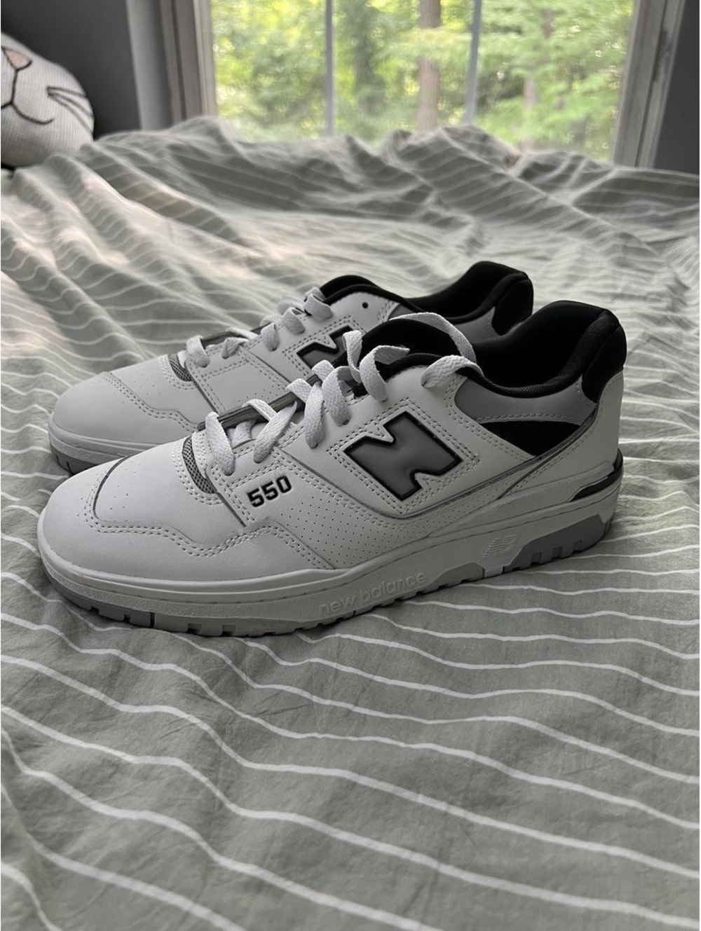 New Balance 550 white and black sneakers